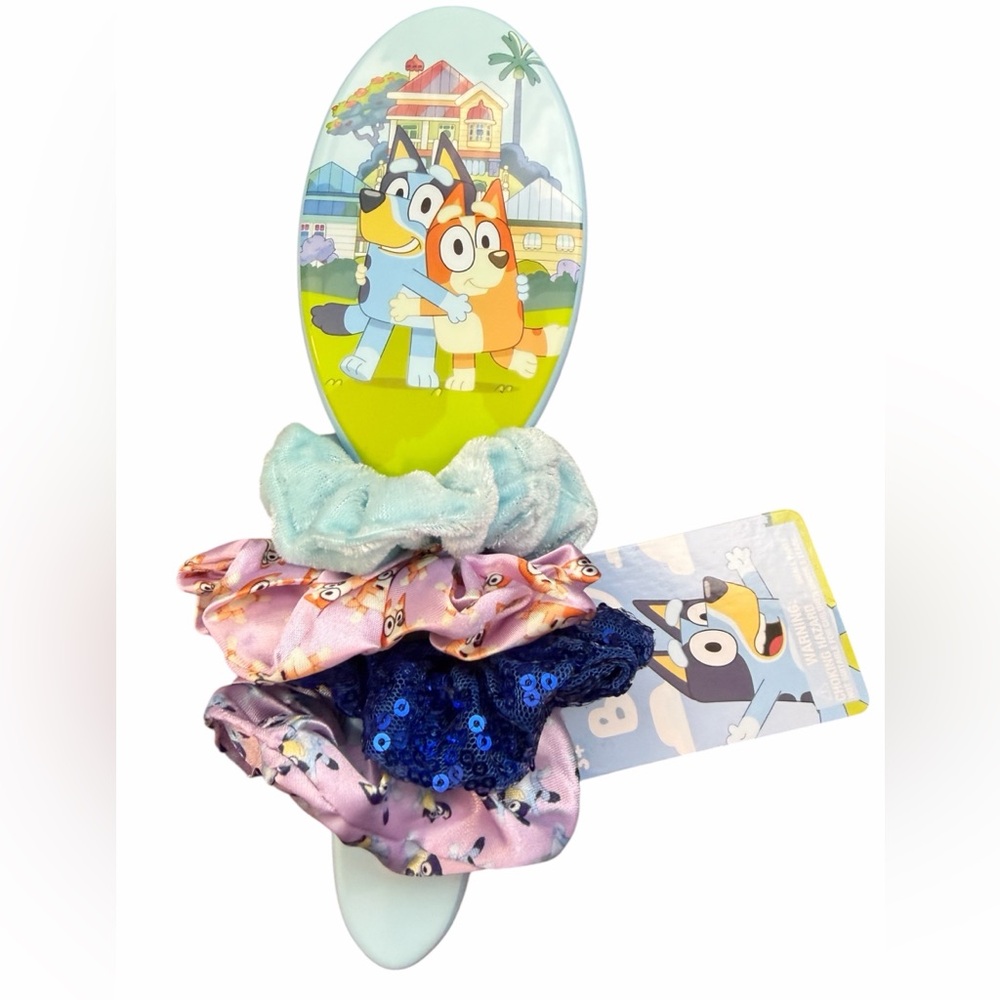 Bluey brush with 4 scrunchies! Brand new with tags! Perfect for any Bluey fan!
